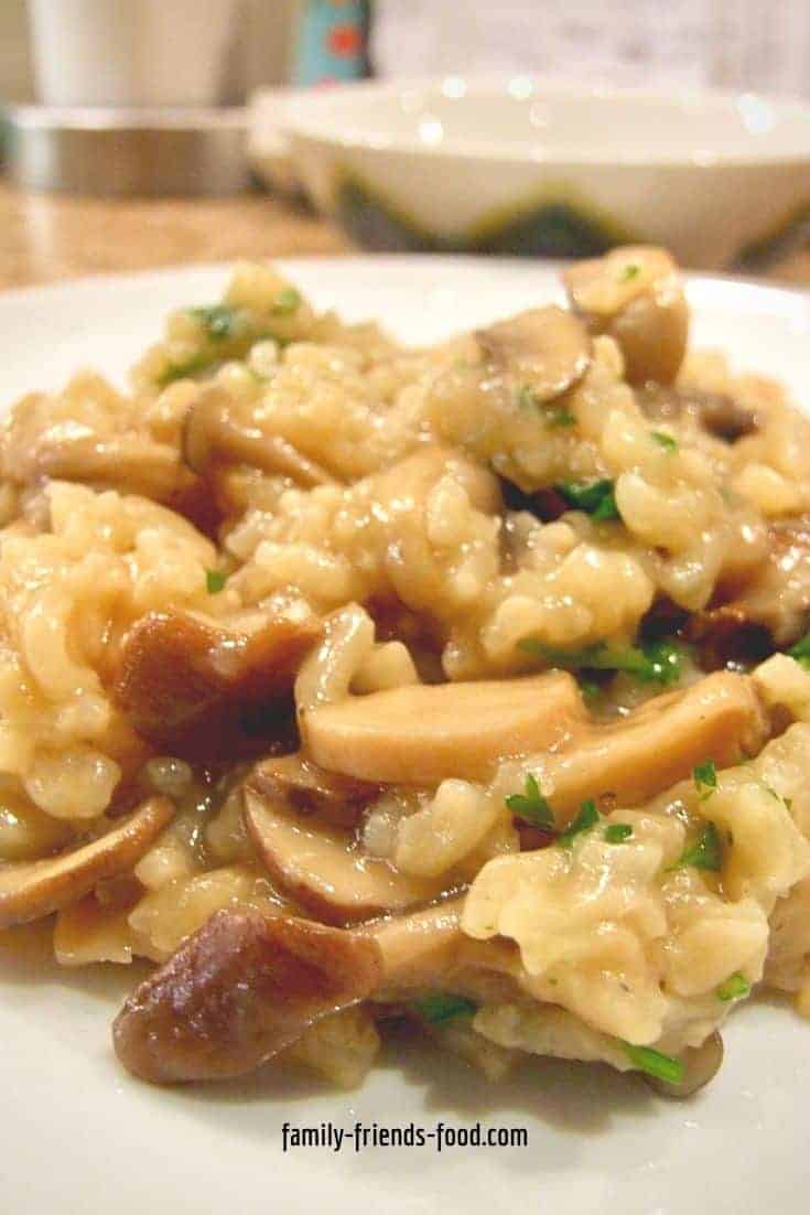 Wild mushroom baked risotto on a plate.