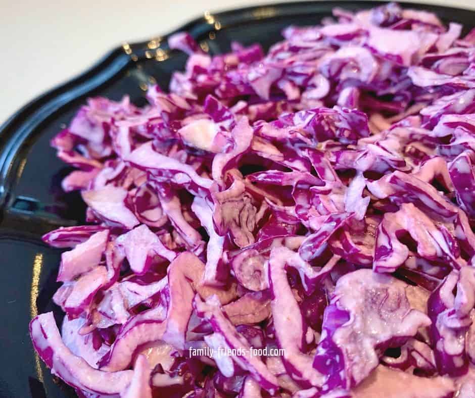 Close up of cabbage salad in a bowl.
